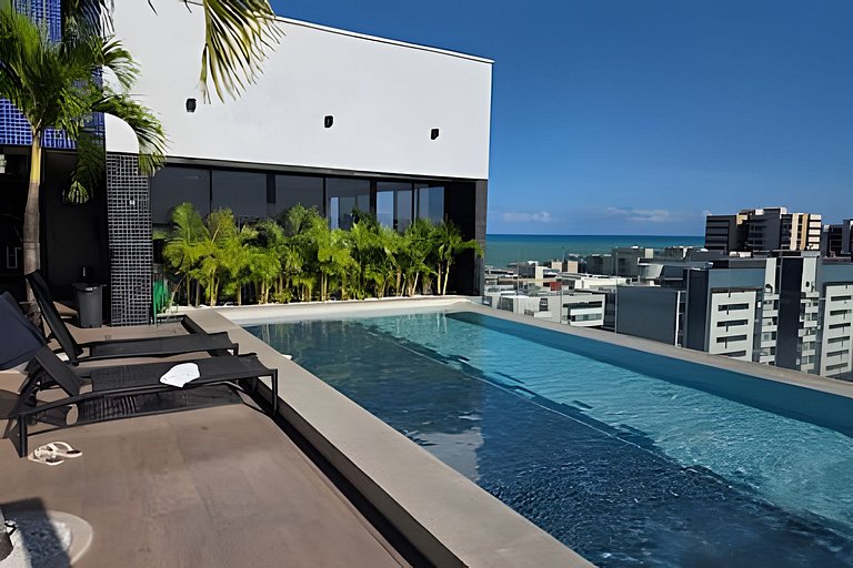 Lindo Studio com Piscina a poucos passos da Praia