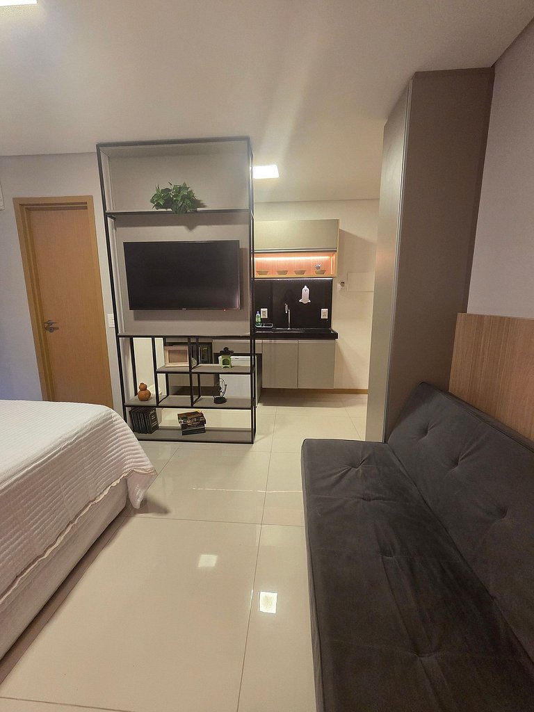 Lindo Studio com Piscina a poucos passos da Praia