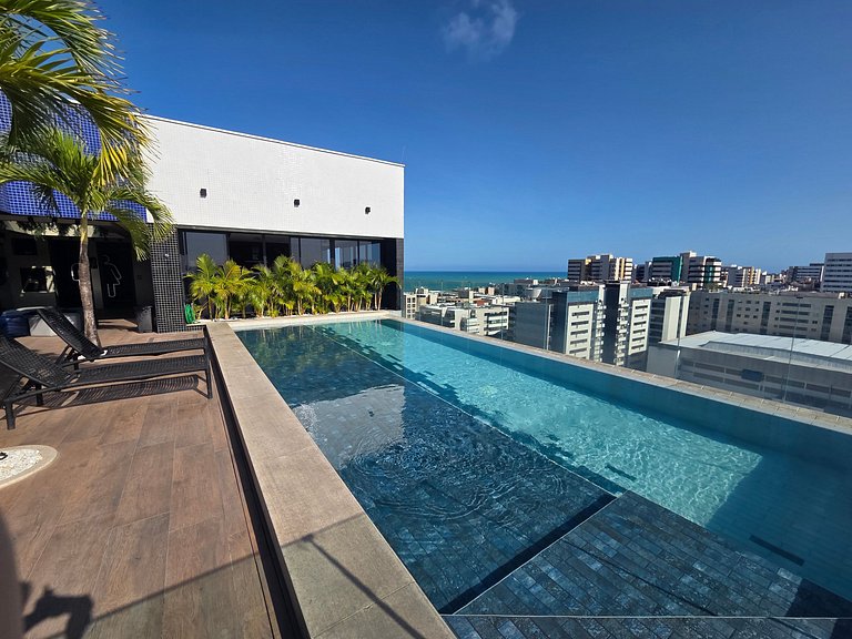 Lindo Studio com Piscina a poucos passos da Praia